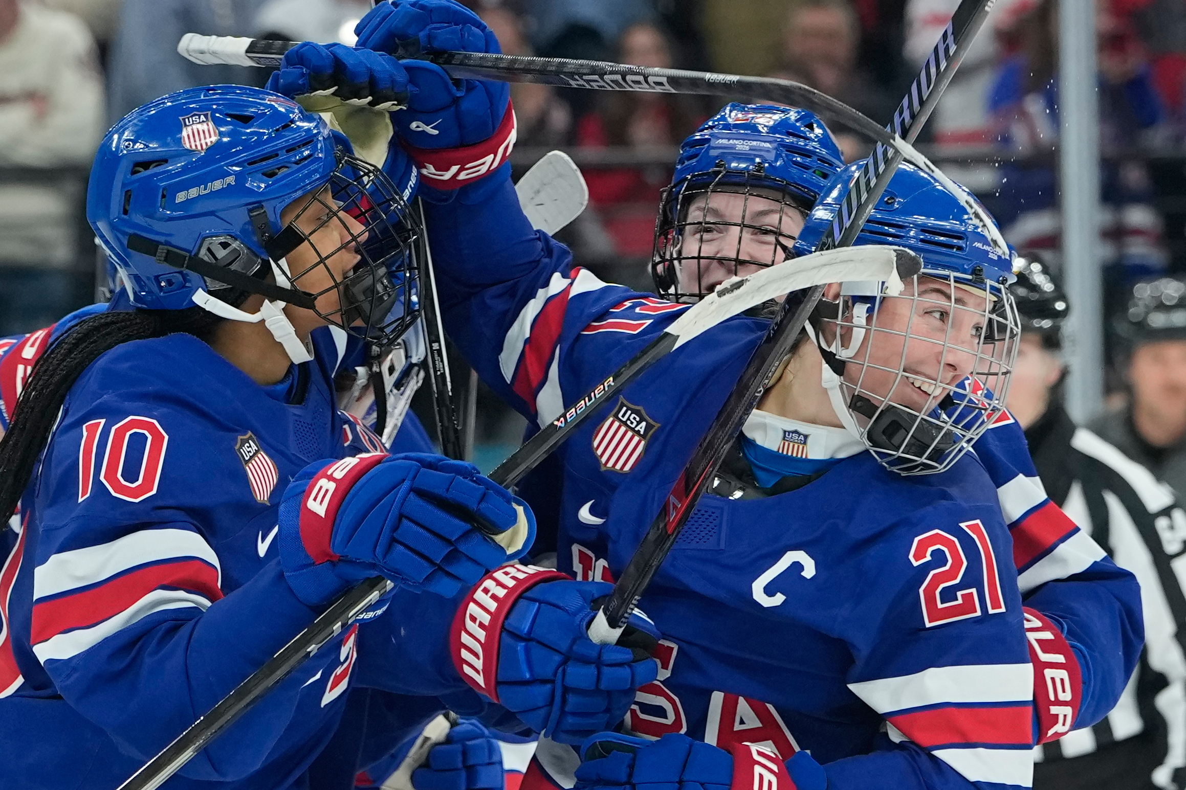 caption: United States' Hilary Knight (21) celebrates after scoring an equalizer during a women's ice hockey gold medal game between the United States and Canada at the 2026 Winter Olympics, in Milan, Italy, Thursday, Feb. 19, 2026. 