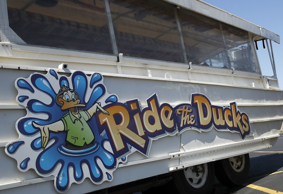 Duck boats sit idle in the parking lot of Ride the Ducks days after the accident in July in Branson, Mo. Kenneth Scott McKee, the captain and operator of a boat that sank on July 19, was charged on Thursday with criminal misconduct and negligence resulting in 17 deaths on Table Rock Lake.