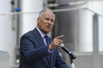 caption: Washington Gov. Jay Inslee speaks during an event at the Blue Plains Advanced Wastewater Treatment Plant in Washington, Thursday, May 16, 2019, during an event where he unveiled part of his plan to defeat climate change. 