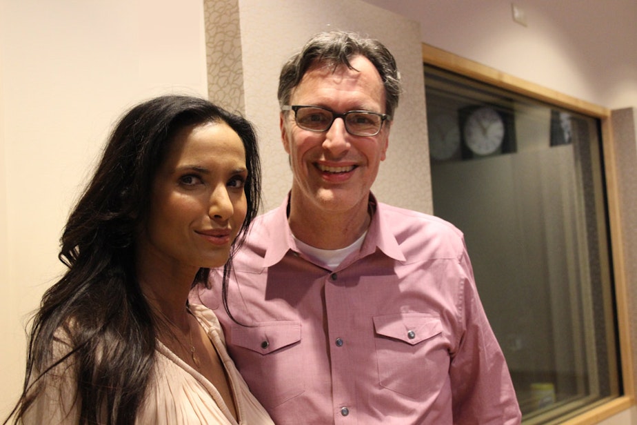 caption: Padma Lakshmi in the KUOW studios with host Bill Radke.