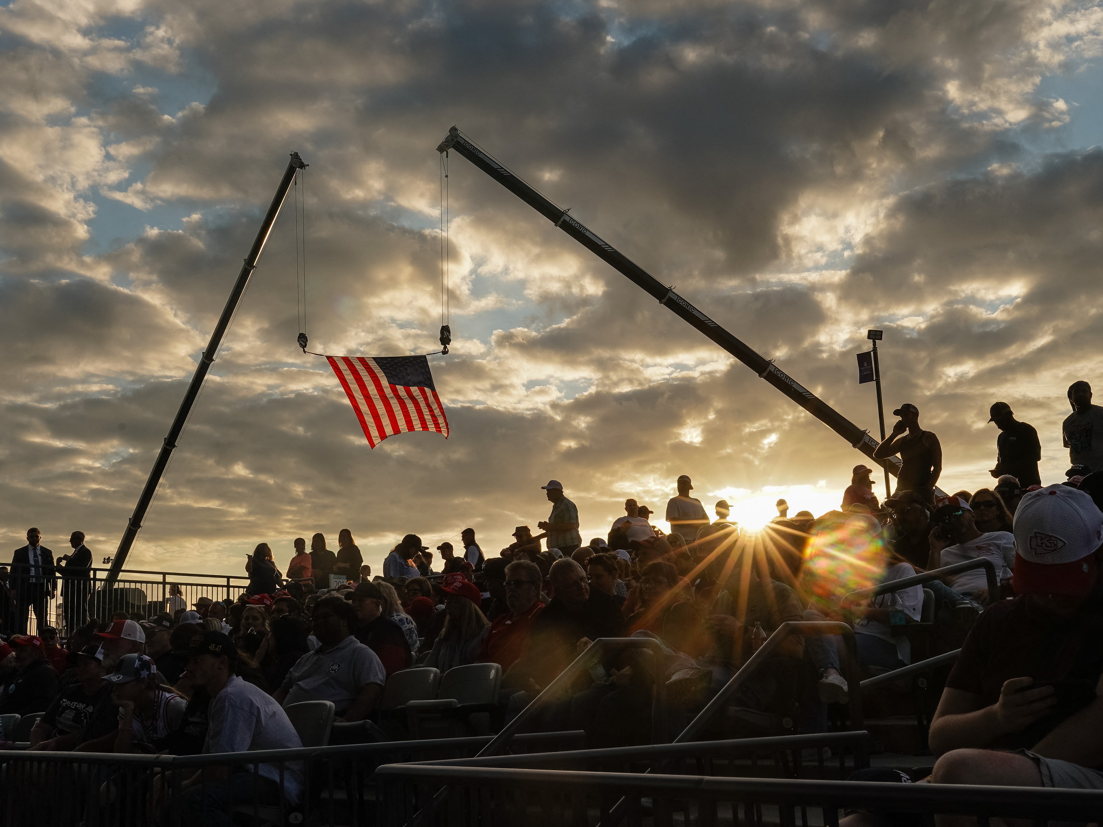 caption: Supporters attend a campaign rally for former President Donald Trump in Macon, Ga., on Nov. 3, 2024.