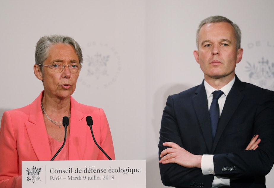 French Transport Minister Elisabeth Borne says a new tax on airfares "is a response to the ecological urgency and sense of injustice expressed by the French." She's seen here with Minister for the Ecological and Inclusive Transition Francois de Rugy.