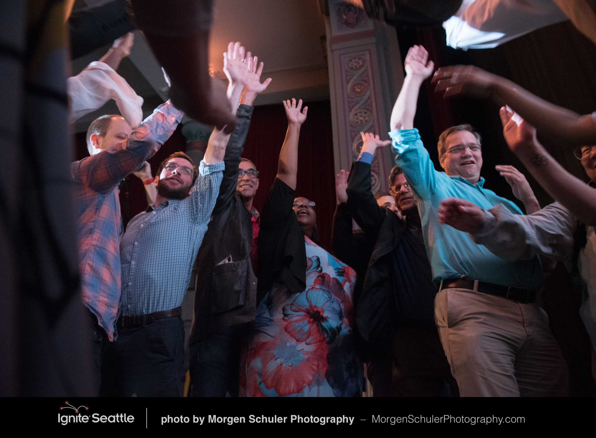 caption: Speakers get ready for Ignite Seattle 34 at the Egyptian Theatre