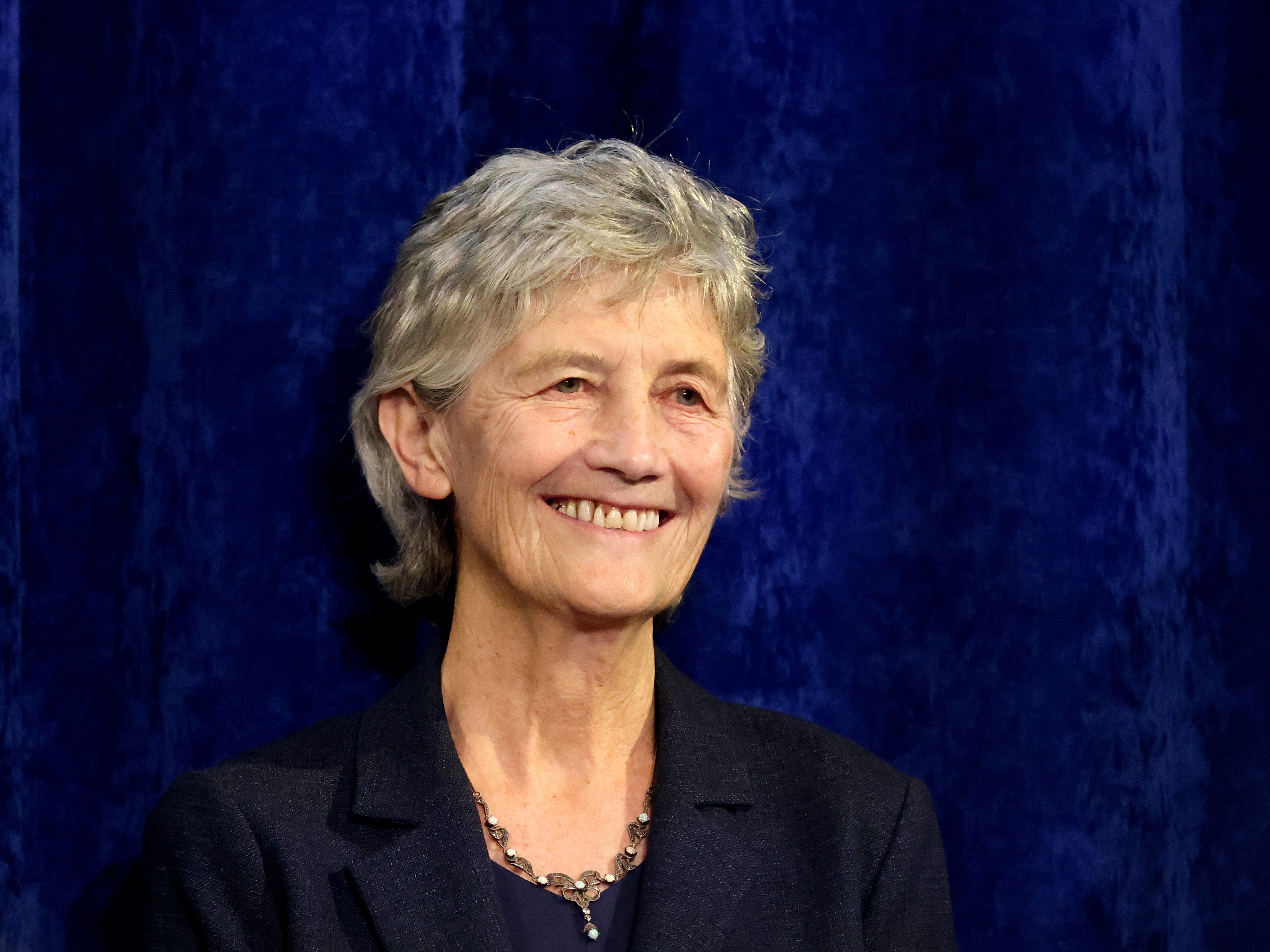 caption: Catherine Connolly smiles to supporters after being elected as the new president of Ireland at Dublin Castle on Saturday.