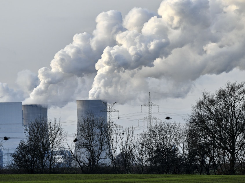 caption: Steam blows from the RWE Niederaussem lignite-fired power station in Bergheim, Germany, in January 2020. Scientists from the National Oceanic and Atmospheric Administration say the concentration of greenhouse gases was the highest on record.