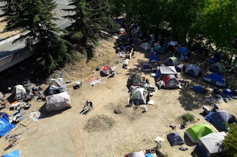 caption: The tent city where Jungle residents are being encouraged to move. 