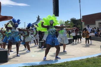 caption: At Umoja Fest, the Washington Diamonds drill team and drum line savored what may be their only performance this summer.