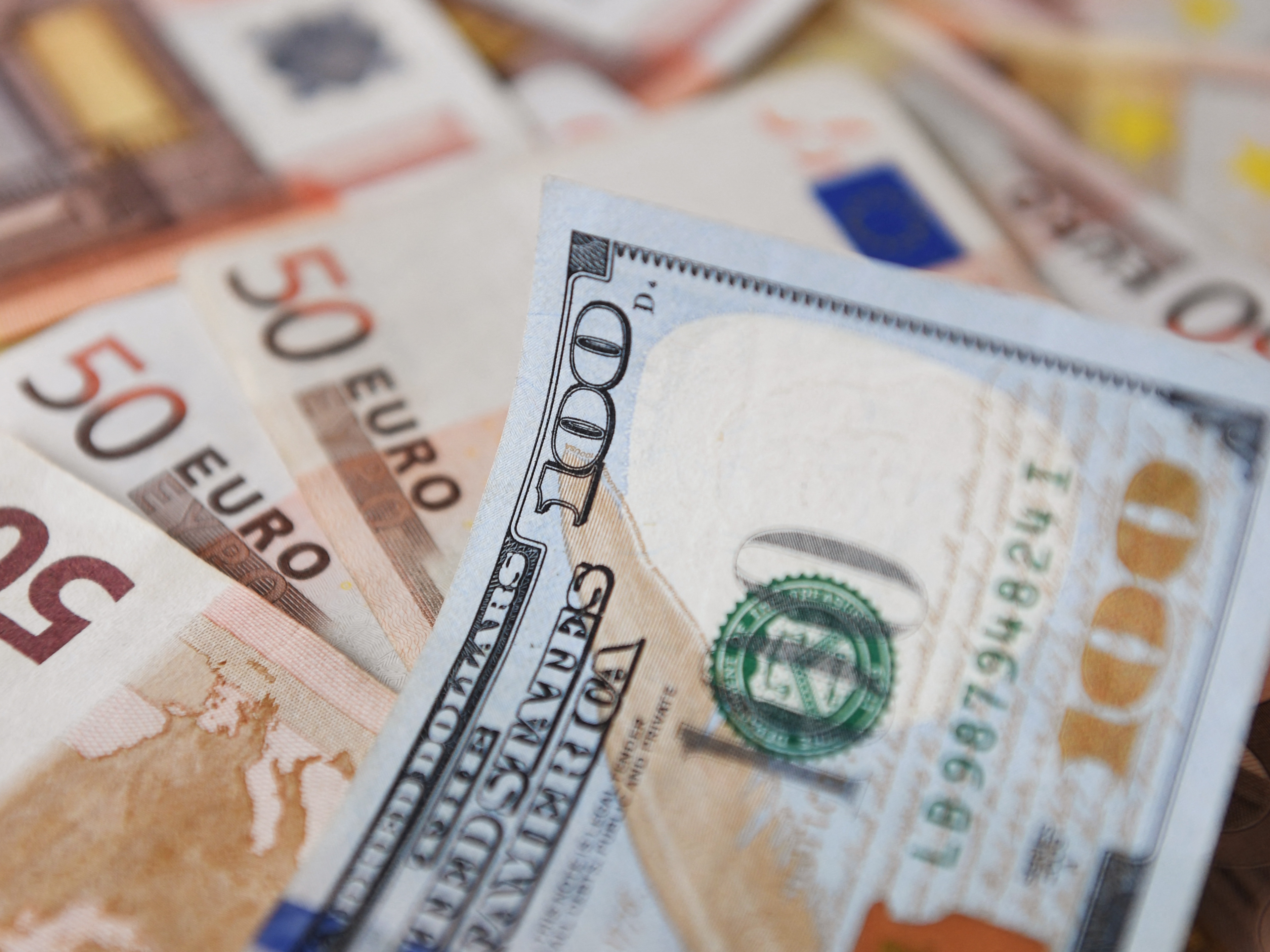 caption: The dollar has slumped more than 10% against other major currencies, marking its worst first-half a year since 1973.