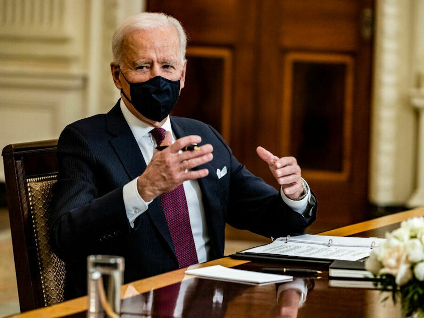 caption: President Biden speaks during a meeting about the American Rescue Plan on March 5, 2021, in Washington, D.C. Some of the pandemic funding allocated in legislation like the American Rescue Plan is being clawed back as part of a budget deal.