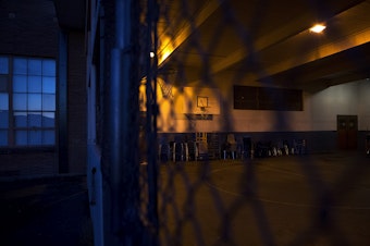 caption: An outdoor play court area at View Ridge Elementary School in northeast Seattle is shown on Thursday, November 19, 2020. A Seattle Schools investigation revealed that a 2nd-grade boy had been placed in this enclosure, dubbed “the cage” by school staff members, on multiple occasions during the school day.
