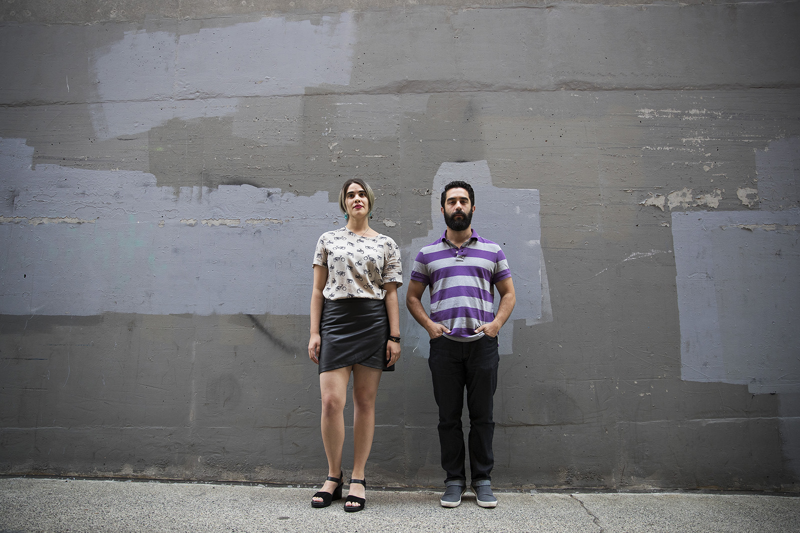 caption: Elisa Chavez (left) and Ian Martinez (right) are slam poets in Seattle.