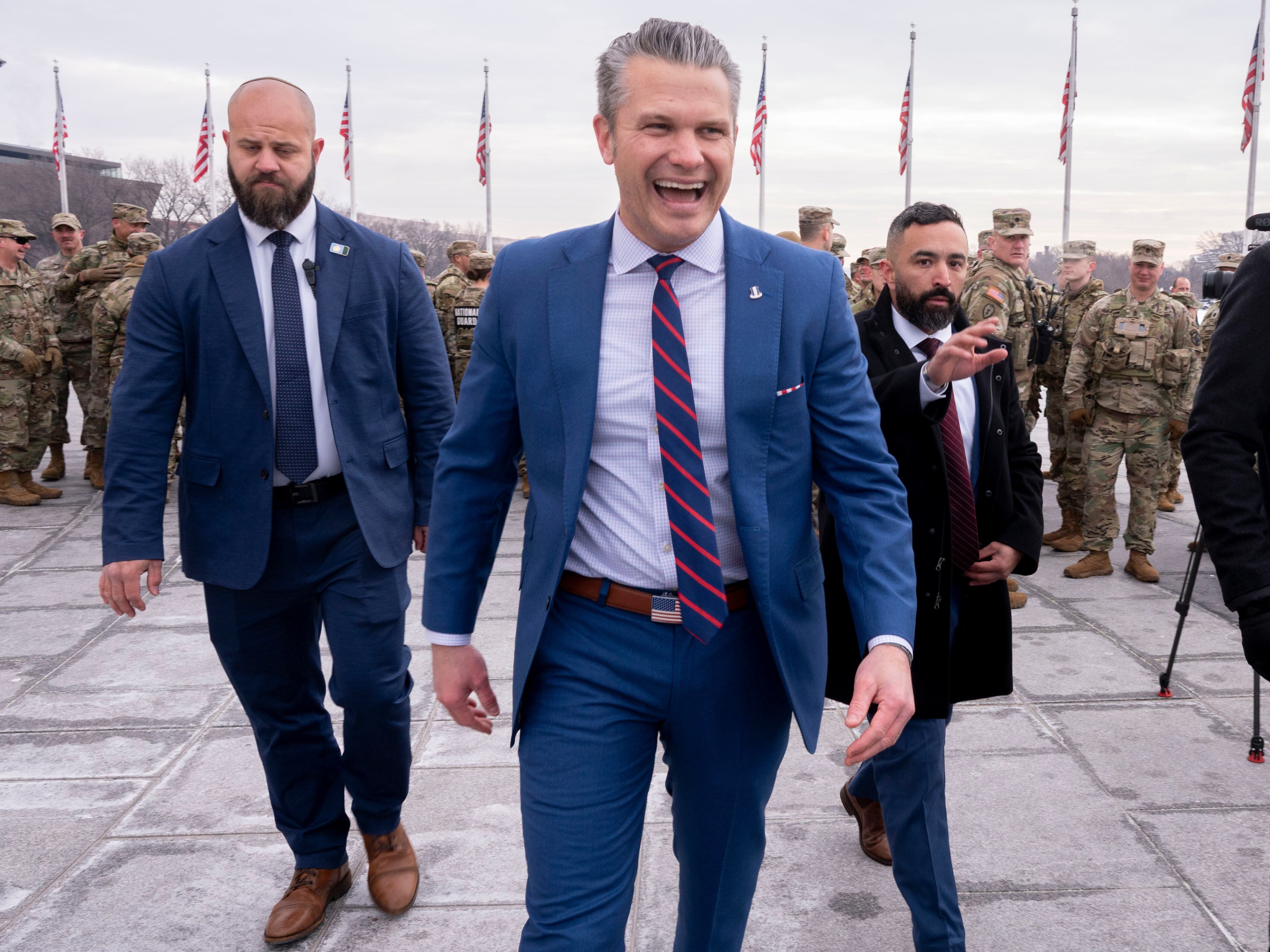 caption: Defense Secretary Pete Hegseth leaves an oath of enlistment ceremony, Friday, Feb. 6, 2026, held on the base of the Washington Monument in Washington, D.C.
