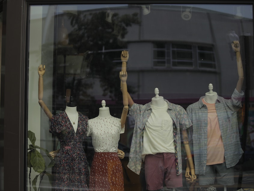 caption: Mannequins in a clothing shop are posed to show solidarity with the Black Lives Matter movement in Washington, D.C., on June 19, 2020. The city was marking Juneteenth, the holiday celebrating the day in 1865 that enslaved Black people in Galveston, Texas, learned they had been freed from bondage, more than two years after the Emancipation Proclamation. Juneteenth is now a federal holiday.
