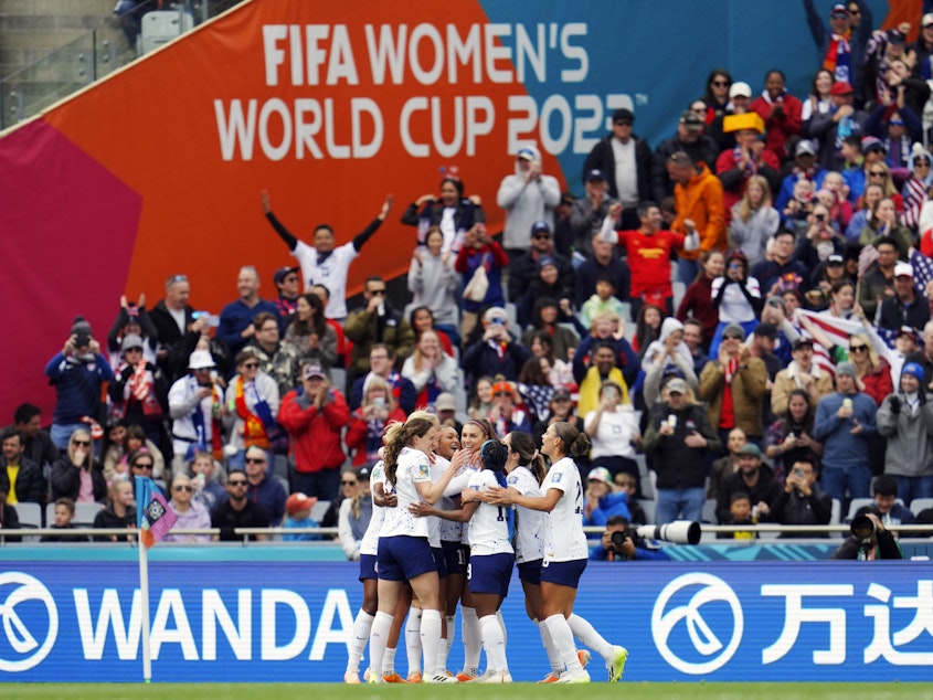 caption: United States players celebrate after Sophia Smith (11) scored their first goal of the Women's World Cup against Vietnam on July 22, 2023. Referees have been adding plenty of extra time due to injuries, substitutions and goal celebrations.
