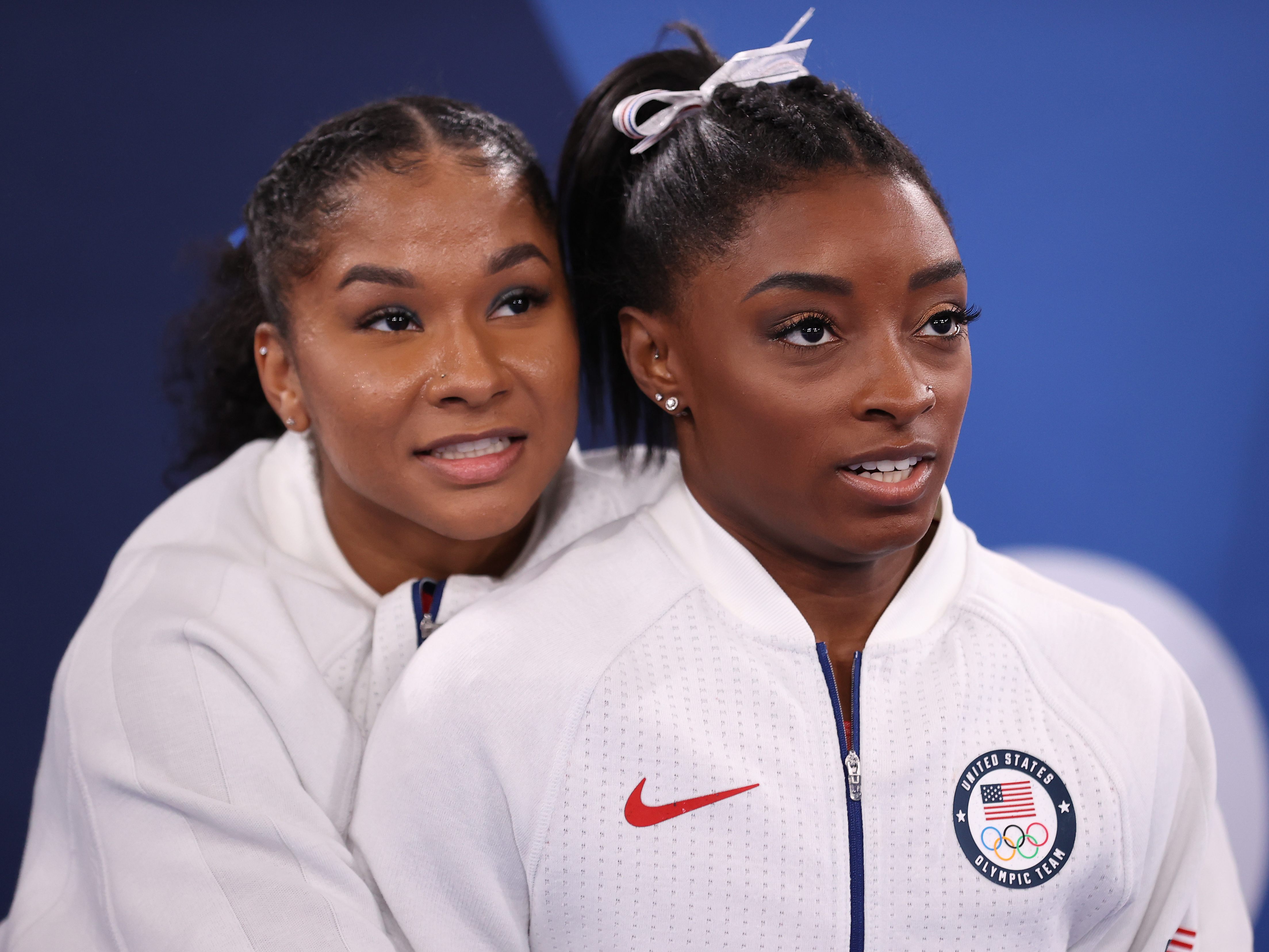 caption: Jordan Chiles (left) and Simone Biles during the women's team final on Tuesday in Tokyo.