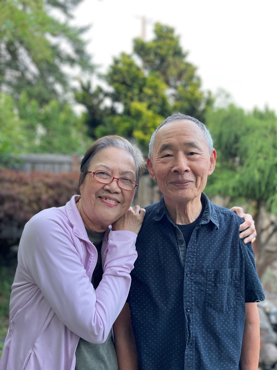 caption: Lê Nguyen (left) and Liem Ton in their garden in Lynnwood, Washington, on July 26, 2023. 