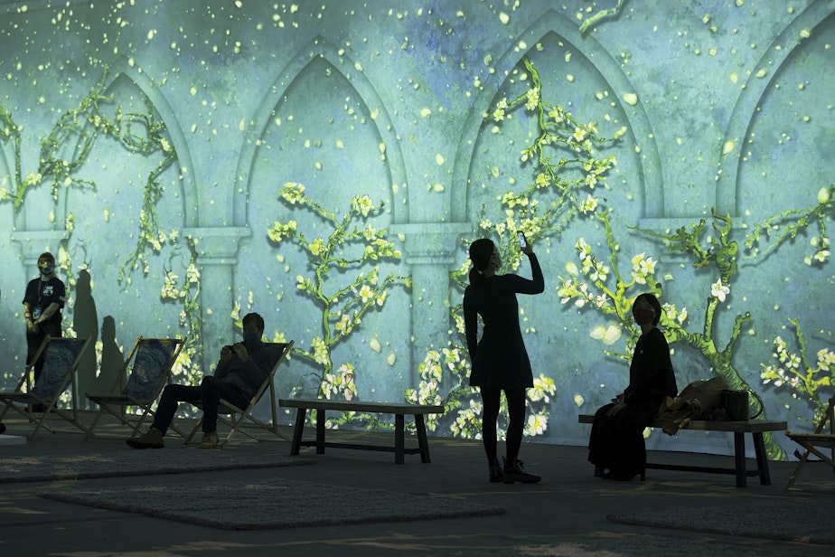 caption: Various projections of Van Gogh's work are displayed in the 360-degree 8,000-square-foot immersive room on Tuesday, October 26, 2021, at the exhibit in Seattle's SODO neighborhood.