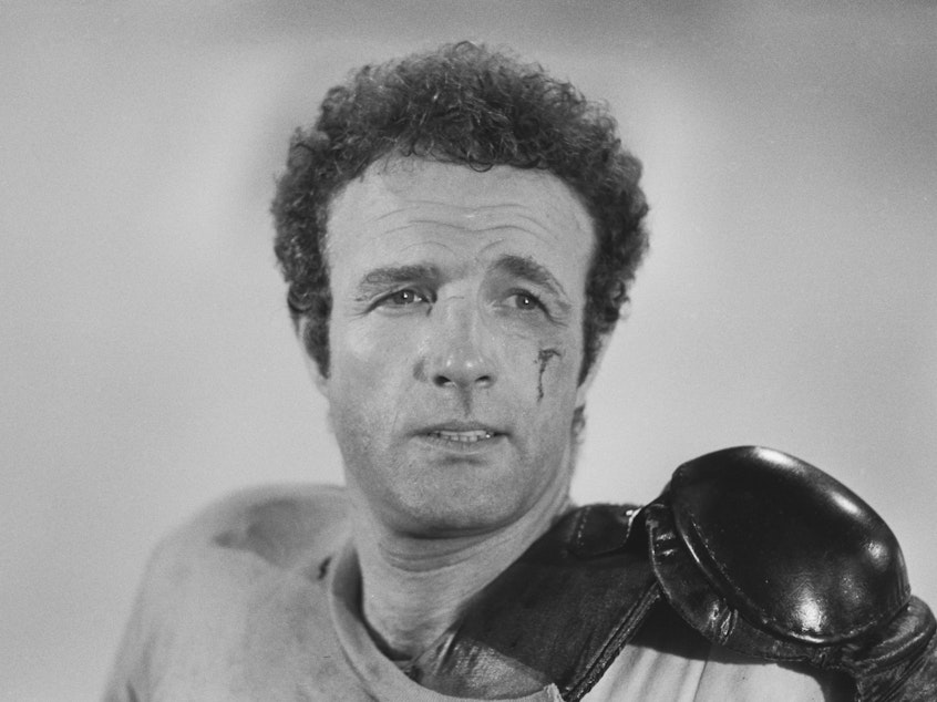 caption: James Caan on the set of the 1975 film <em>Rollerball</em>.