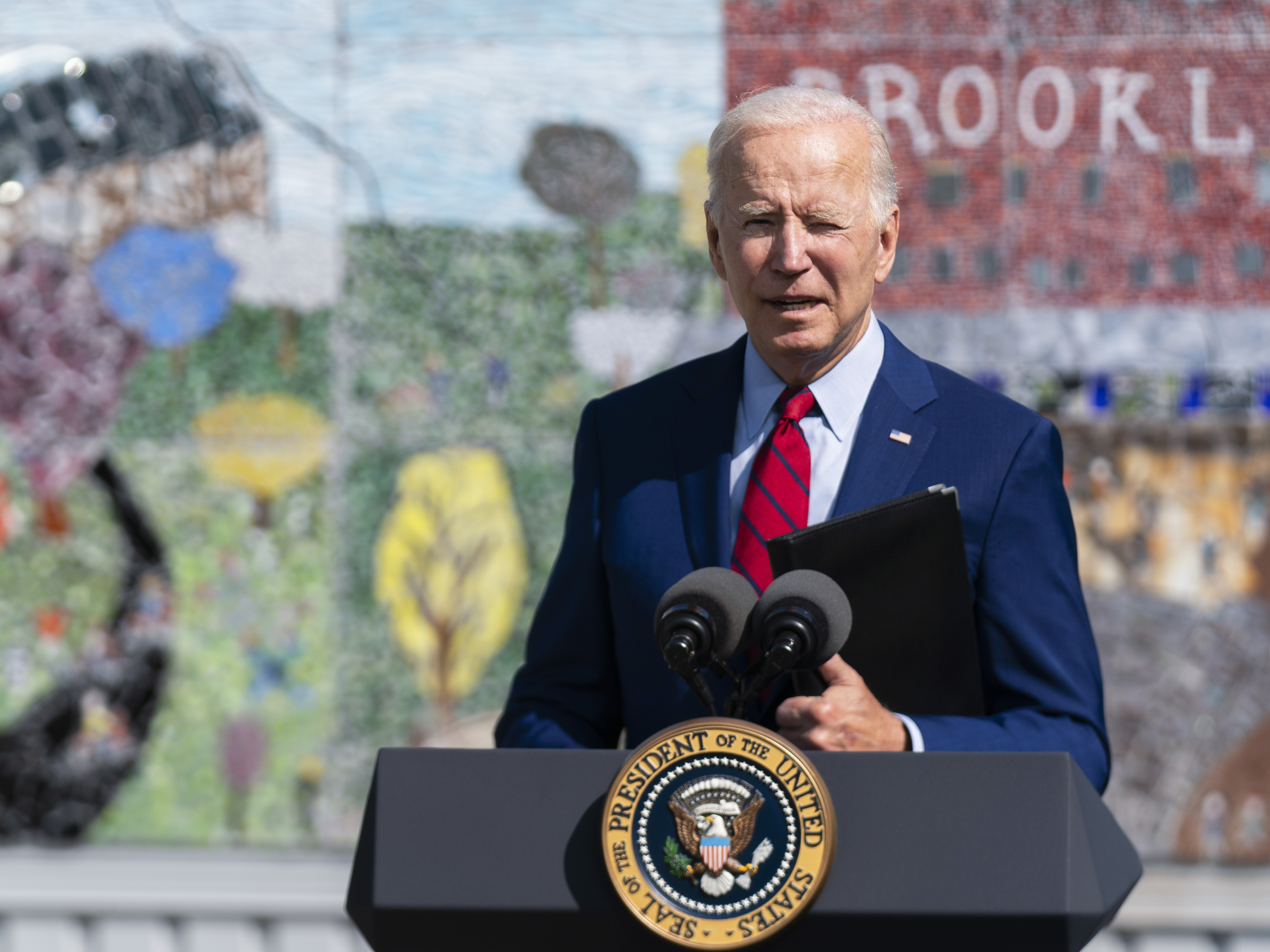 caption: President Joe Biden speaks about his strategy to combat the coronavirus pandemic at Brookland Middle School on  Friday in Washington, D.C. Later in the day, he issued a video commemorating the 20th anniversary of the Sept. 11 terrorist attacks.
