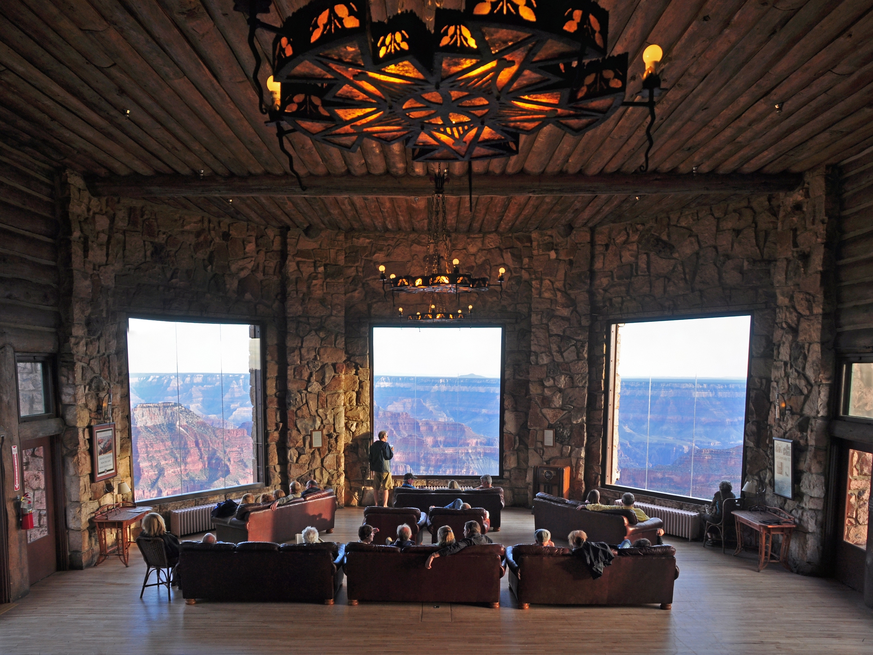 caption: The view from the rebuilt Grand Canyon Lodge, the sole hotel on the canyon's North Rim. It was destroyed in a wildfire over the weekend, nearly a century after the original burned down.