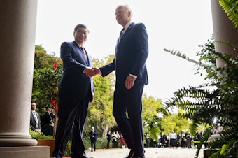 caption: U.S. President Joe Biden greets China's President President Xi Jinping at the Filoli Estate in Woodside, Calif., Wednesday, Nov, 15, 2023, on the sidelines of the Asia-Pacific Economic Cooperative conference.