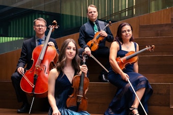 caption: The Apollo Chamber Players create concerts in response to book banning, the refugee crisis, the war in Gaza and other world events. The members of the Houston based ensemble are Matthew Dudzik, left, Aria Cheregosha, Matthew J. Detrick and Anabel Ramírez.