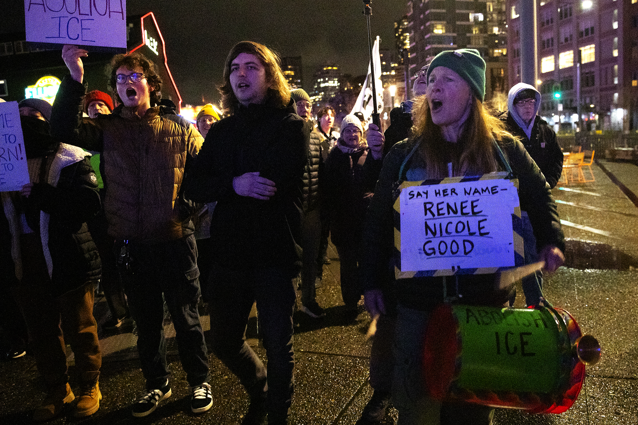 caption: Hundreds attend a vigil and march honoring those who have been killed by ICE agents, including Renee Nicole Good, on Thursday, January 8, 2026, at Pier 58 in Seattle. 