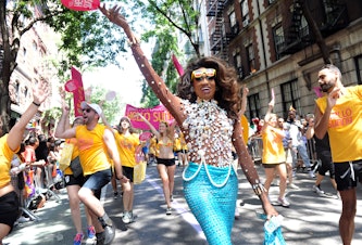 caption: Lashauwn Beyond, of Fort Lauderdale, Florida, featured in RuPaul's Drag Race and the face of the Greater Fort Lauderdale Convention & Visitors Bureau LGBT campaign, marches in the New York Gay Pride Parade in 2014.