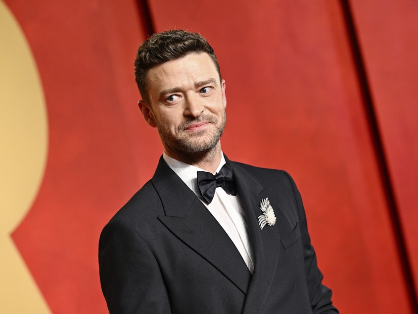 caption: Justin Timberlake, pictured at the Vanity Fair Oscar Party in March, has been arrested for driving while intoxicated. 