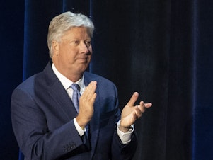 caption: Pastor Robert Morris applauds during a roundtable discussion at Gateway Church in Dallas on June 11, 2020. A statement issued on Tuesday, June 18, 2024, said that Morris has resigned after a woman said he had abused her on multiple occasions in the 1980s, beginning when she was 12.