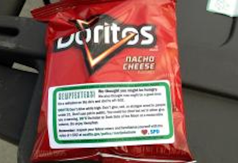 caption: The SPD Doritos giveaway at last year's Hempfest was a viral hit, but it is now the subject of a complaint.