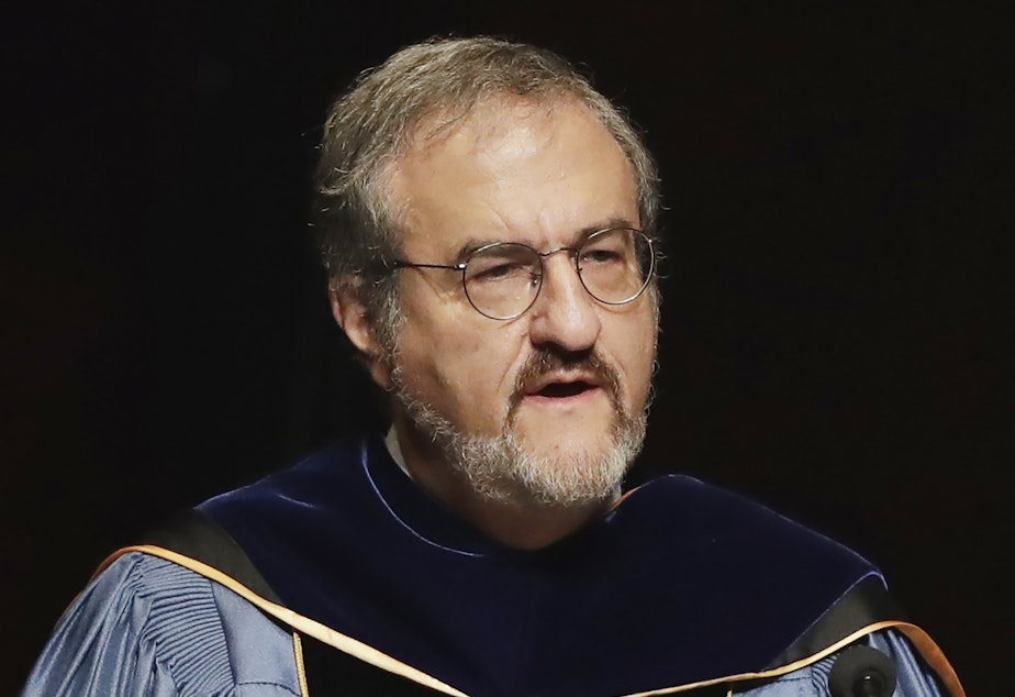 caption: In this Jan. 30 2017, file photo, University of Michigan President Mark Schlissel speaks during a ceremony at the university, in Ann Arbor, Mich. Schlissel has been removed as president of the University of Michigan due to the alleged "inappropriate relationship with a University employee," the school said.