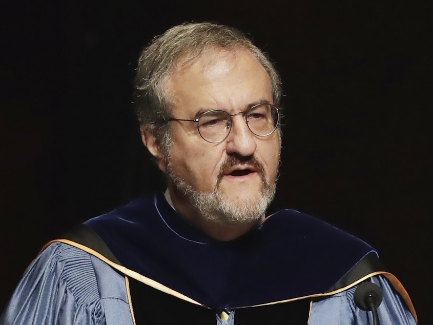 caption: In this Jan. 30 2017, file photo, University of Michigan President Mark Schlissel speaks during a ceremony at the university, in Ann Arbor, Mich. Schlissel has been removed as president of the University of Michigan due to the alleged "inappropriate relationship with a University employee," the school said.