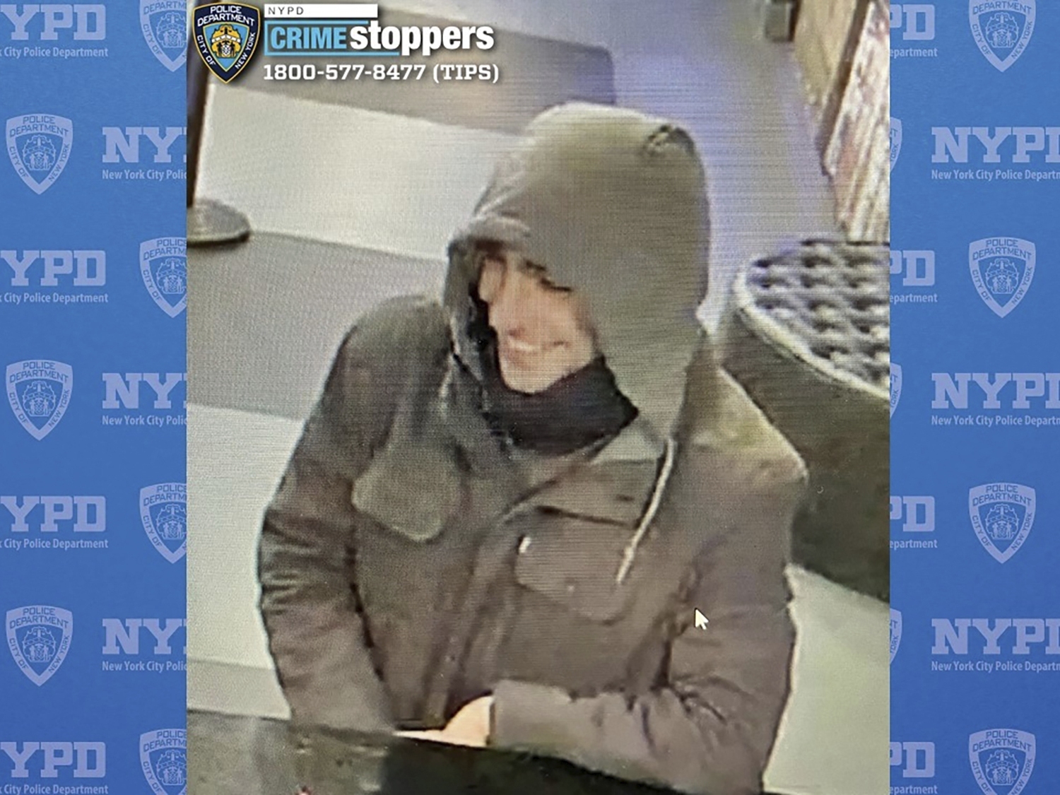 caption: This image provided by the New York City Police Department shows a person of interest in the investigation of the killing of UnitedHealthcare CEO Brian Thompson outside a Manhattan hotel on Wednesday.
