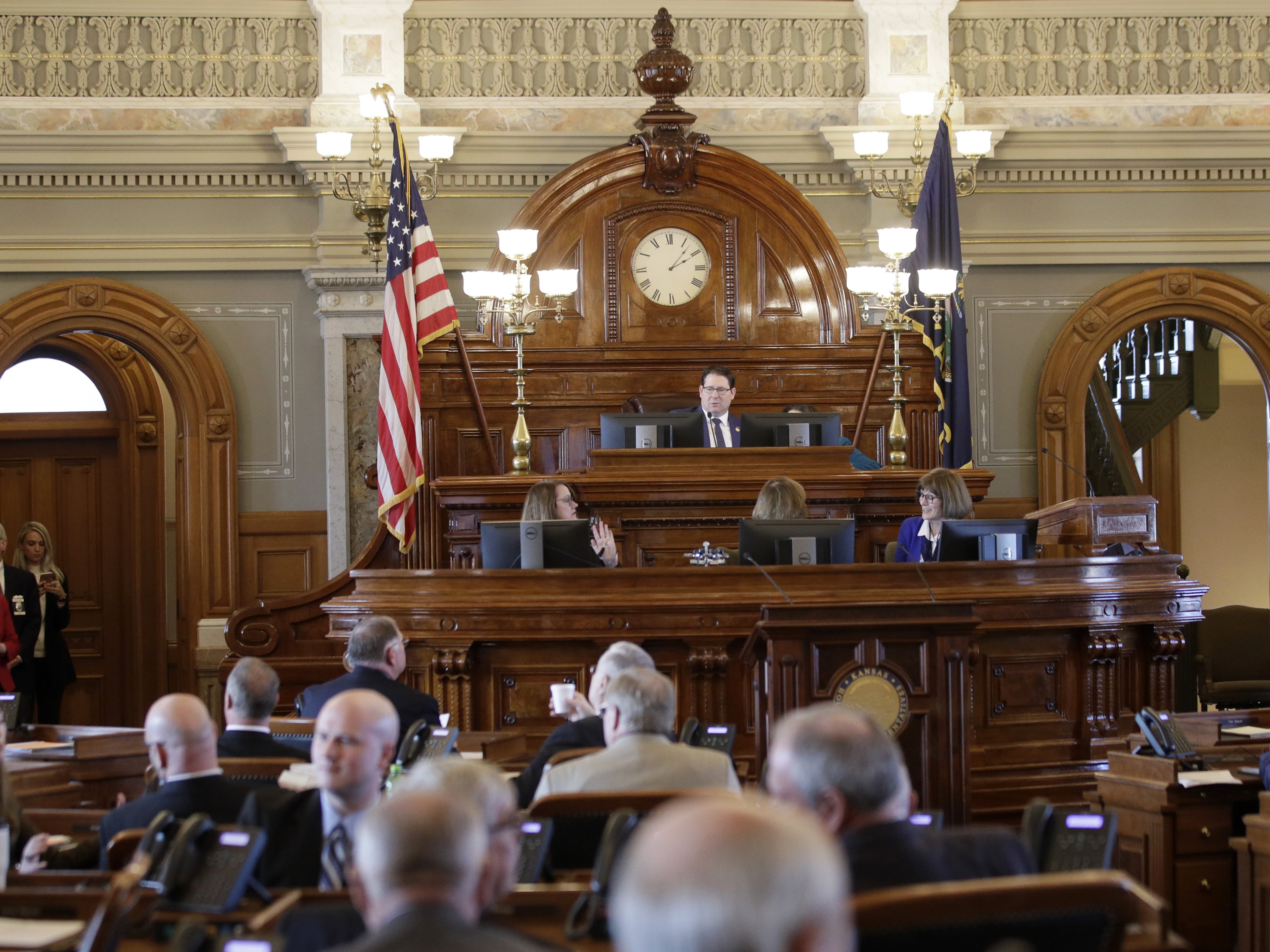 caption: The Kansas Legislature, seen here opening its lawmaking session in January, 2020, is one of 20 states where Republicans have a "supermajority" that allows them to override vetoes by the governor. Kansas Democrats hope to break the supermajority in the November election.