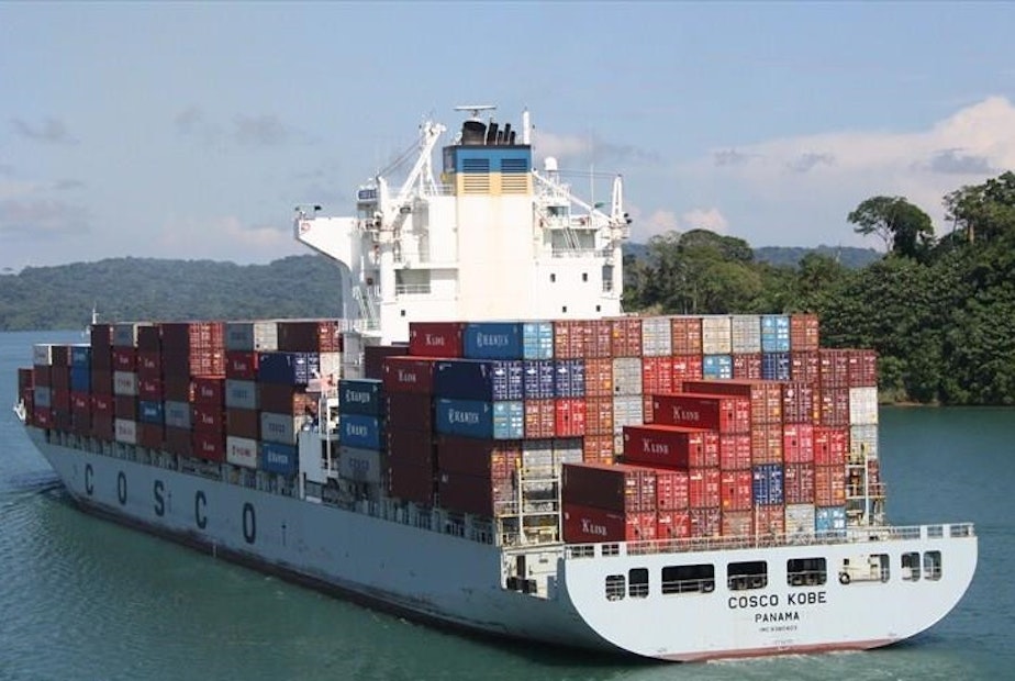 caption: The 850-foot Dyros, then called the Cosco Kobe, in the Panama Canal in 2013