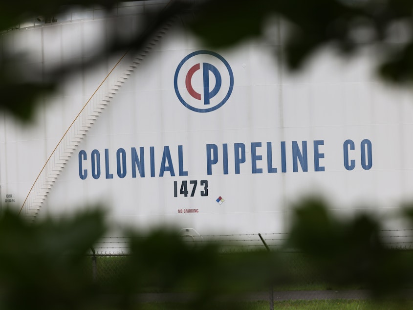 caption: A fuel tank is seen at Colonial Pipeline's Linden Junction tank farm in Woodbridge, N.J., on May 10.
