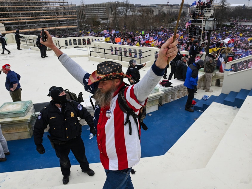caption: Trump supporters clash with police and security forces as they invade the U.S. Capitol on Wednesday.