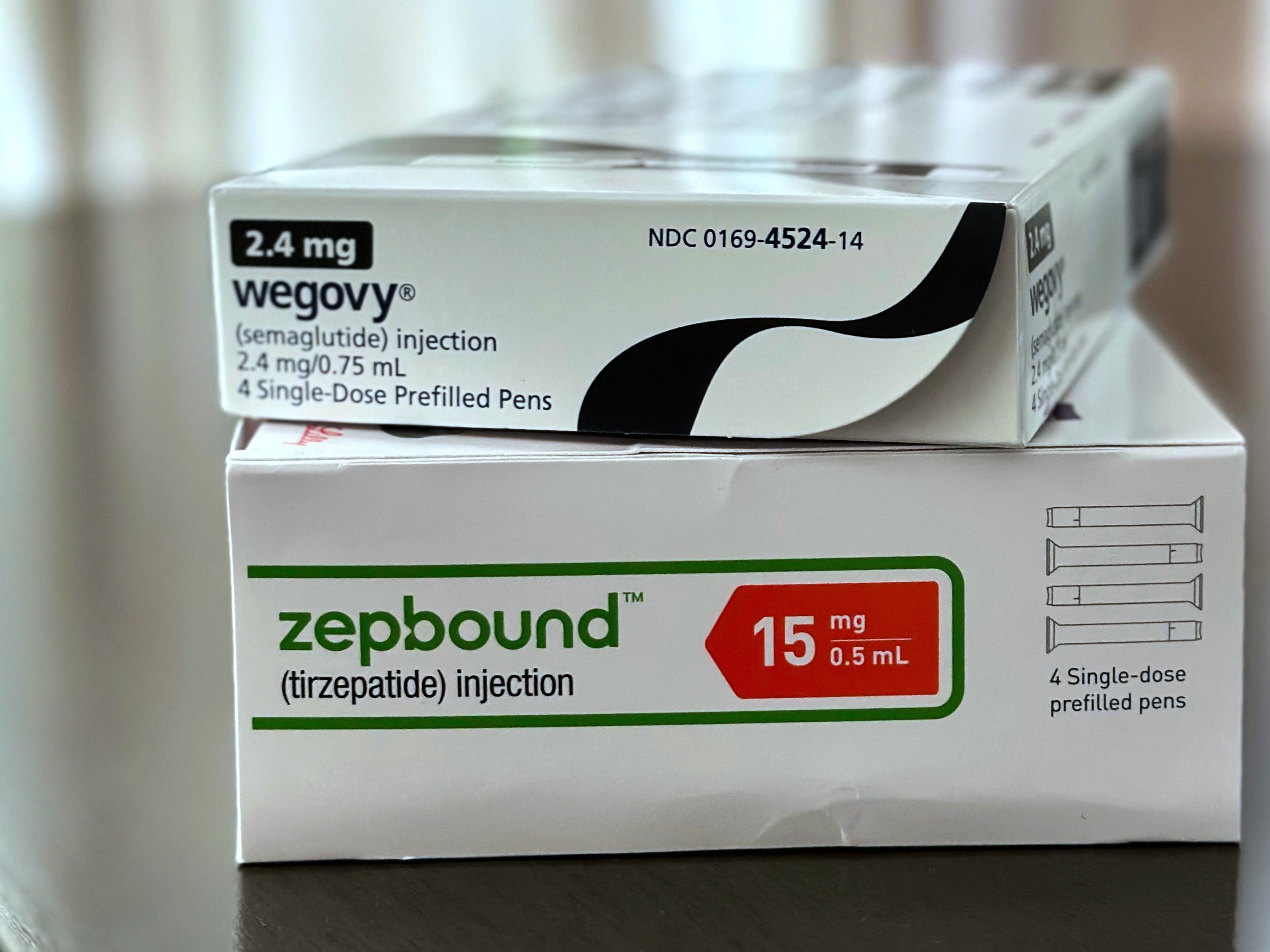 caption: Wegovy and Zepbound are GLP-1 weight loss treatments. They are available by prescription.