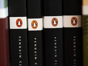 caption: Penguin Random House, the largest publisher in the U.S., has sued a Florida county school board over its decisions to ban and restrict access to books. Joining the lawsuit are five authors, two parents of students and the advocacy group PEN America.