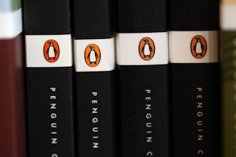 caption: Penguin Random House, the largest publisher in the U.S., has sued a Florida county school board over its decisions to ban and restrict access to books. Joining the lawsuit are five authors, two parents of students and the advocacy group PEN America.