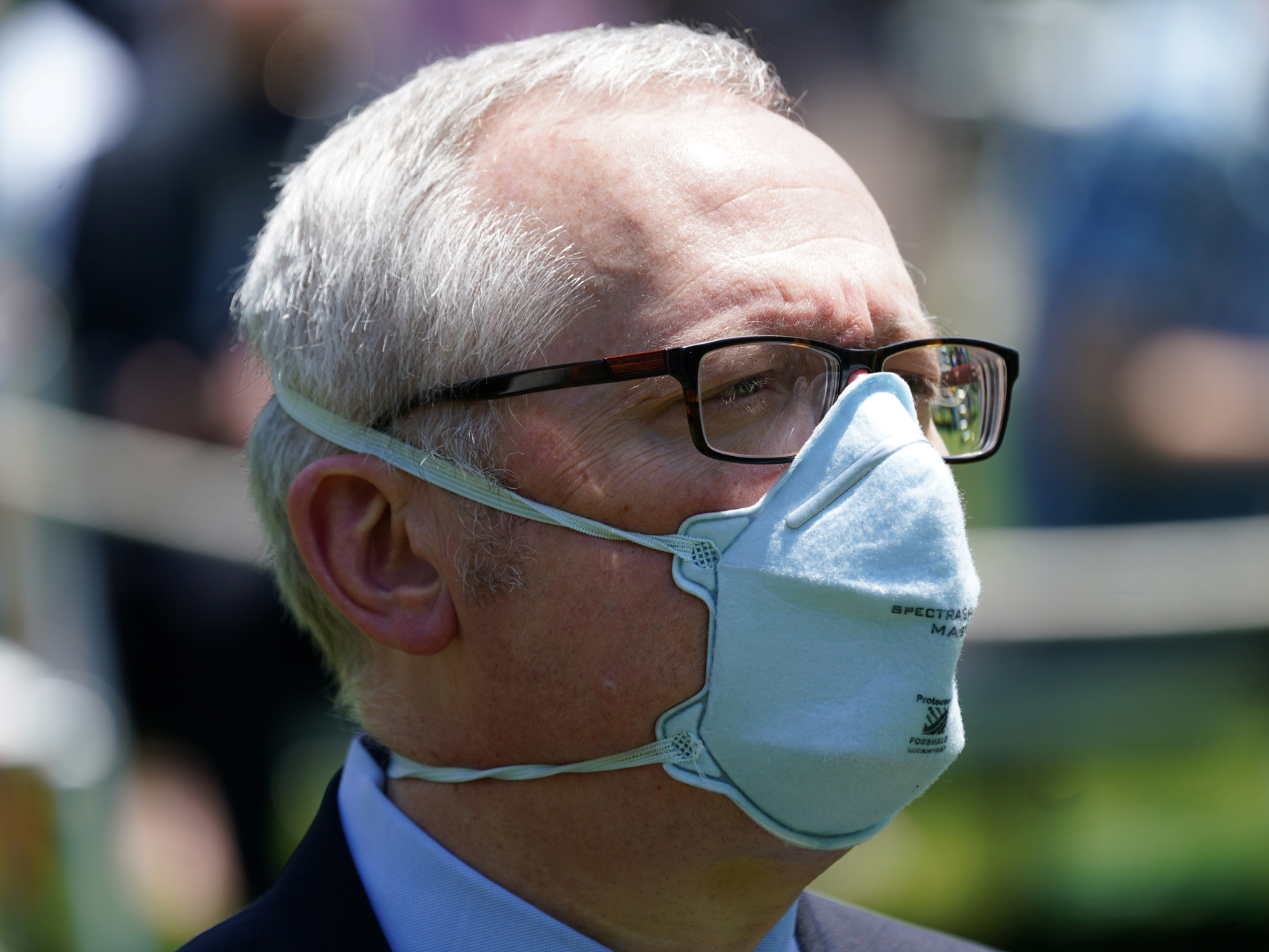caption: Michael Caputo, pictured at a White House event, is taking a 60-day leave of absence from his job as lead spokesperson for the Department of Health and Human Services after alleging President Trump's opponents have interfered in the coronavirus response.