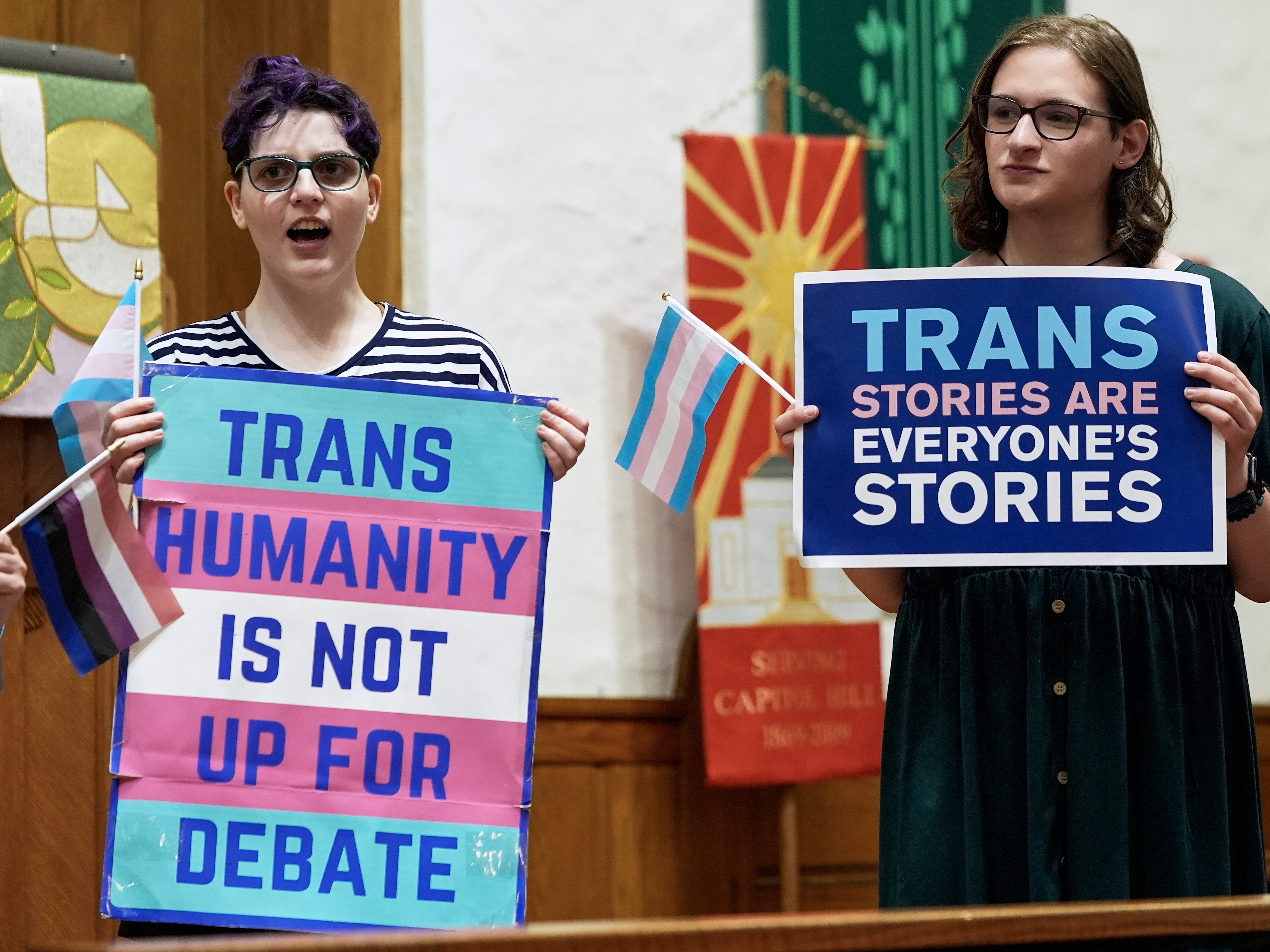 caption: Transgender rights supporters rallied at the Lutheran Church of the Reformation in Washington, DC, after the Supreme Court upheld Tennessee's ban on gender-affirming care for transgender minors in June 2025.