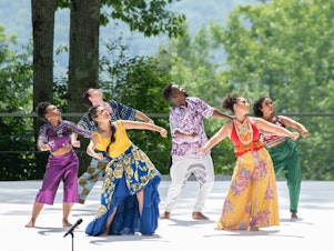 caption: Faced with limited access to conventional stages, troupes like Contra-Tiempo are taking advantage of striking outdoor spaces at Jacob's Pillow this summer.