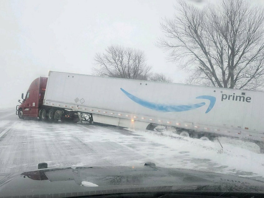caption: A tractor trailer veers into ditch on Christmas Day on Interstate 80 in Nebraska as a winter storm pummels part of the Midwest. Forecasters are predicting that heavy snow and blizzard conditions will continue through early Wednesday across part of the north-central U.S.