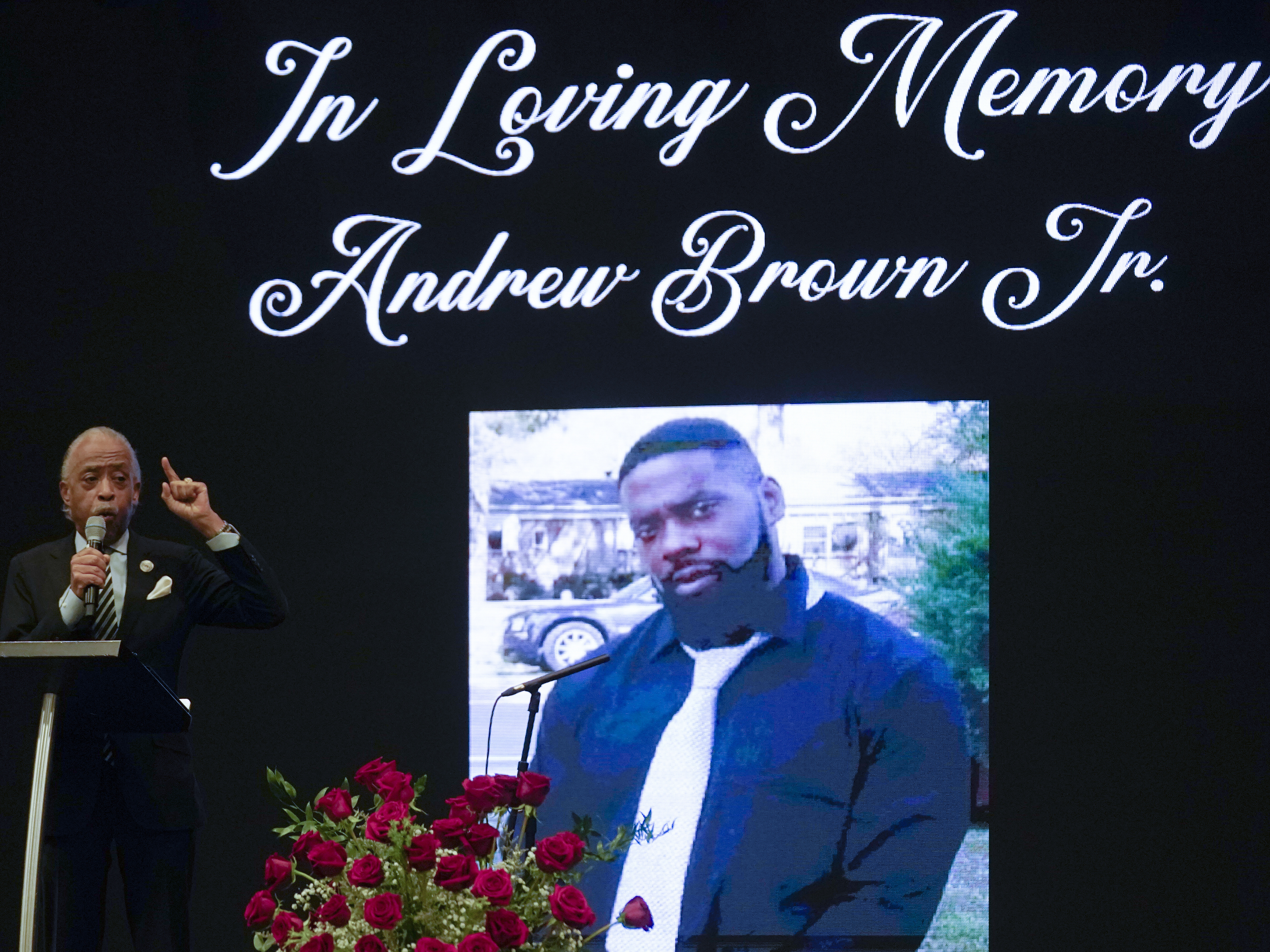 caption: Rev. Al Sharpton speaks during the funeral for Andrew Brown Jr. on May 3, 2021, at Fountain of Life Church in Elizabeth City, N.C.