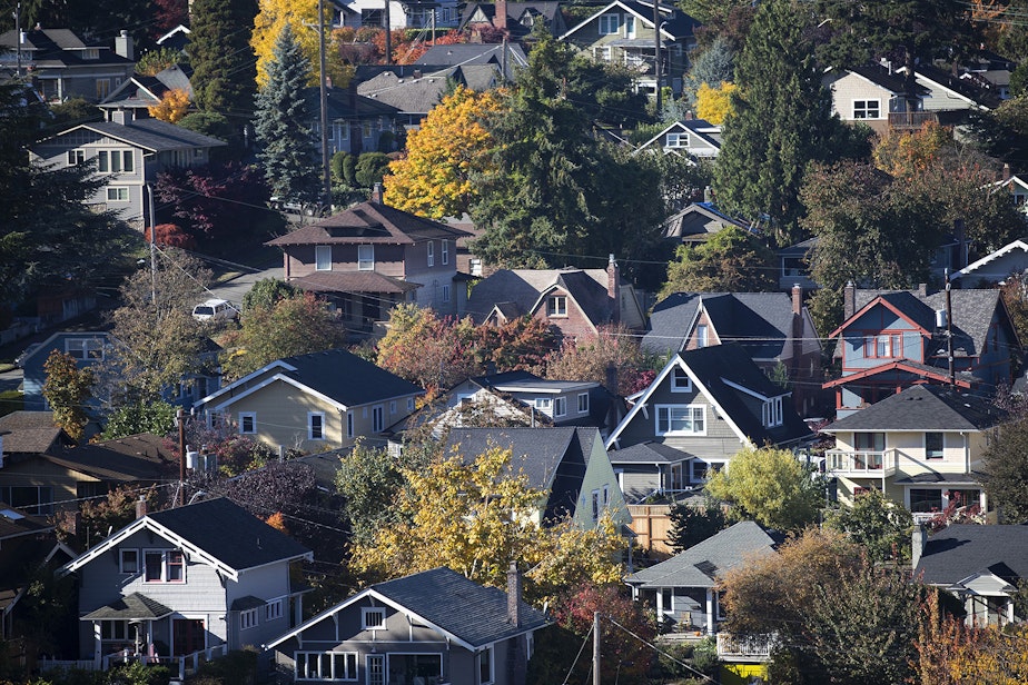 caption: Homes in Queen Anne are shown from the Aurora Bridge on Friday, October 27, 2017, in Seattle. 