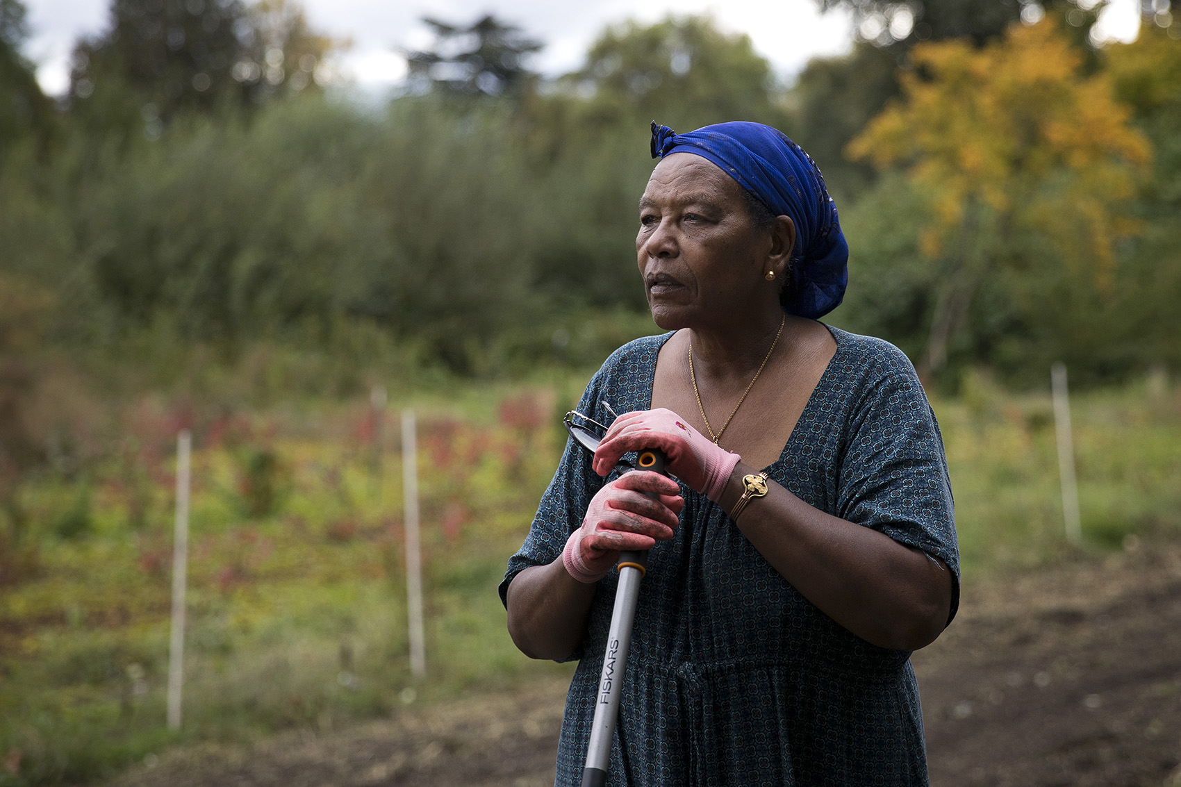caption: Turunesh Gura, 78, takes a break from working on Friday, October 13, 2017, at the Rainier Beach Urban Farm and Wetlands in Seattle. Tap to see more pictures.