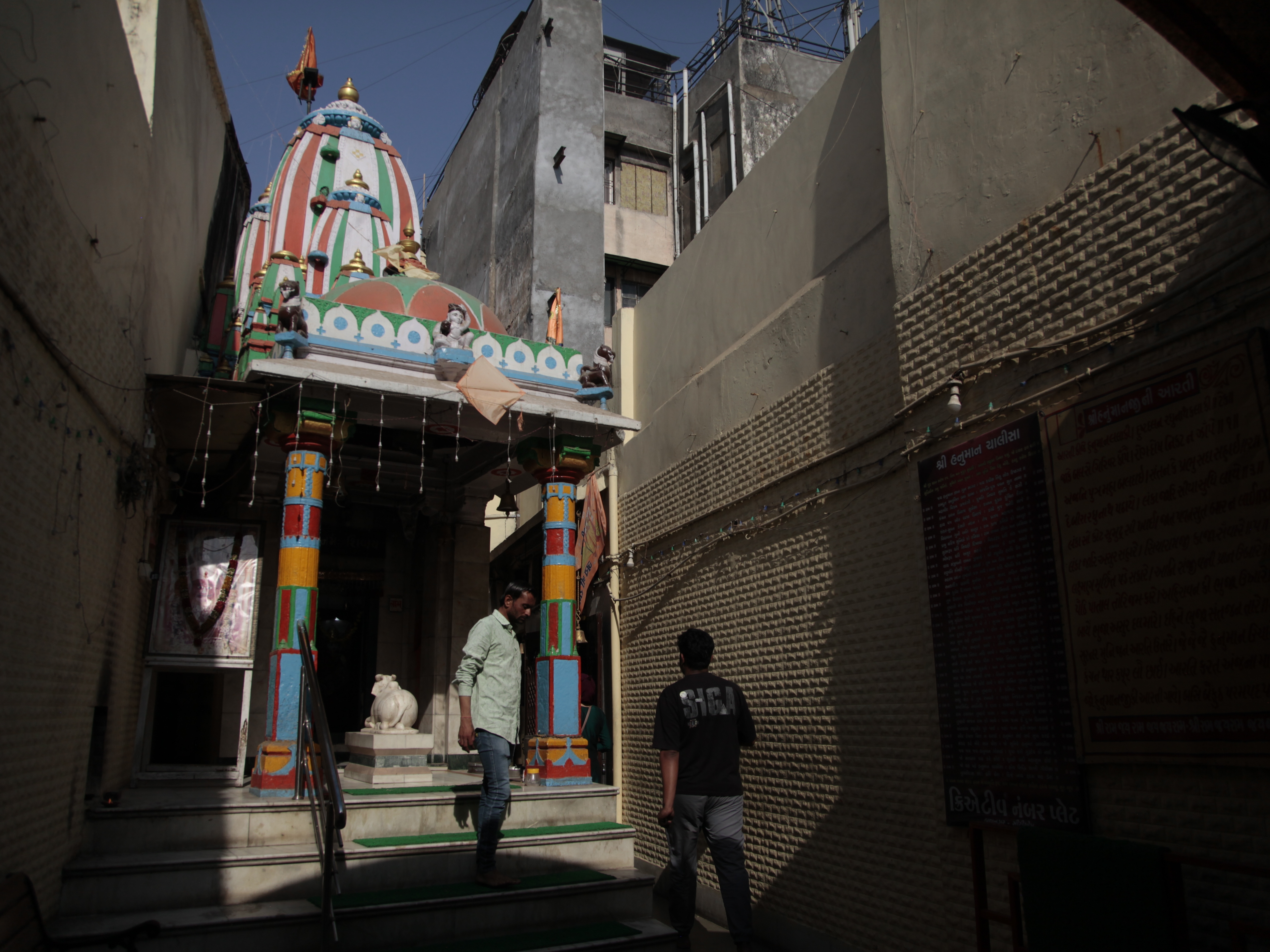 caption: The Chamatkarik Shree Hanumanji Mandir in the old city of Ahmedabad, in western India, is seen by worshippers as a place where prayers to obtain visas to Western countries are answered.