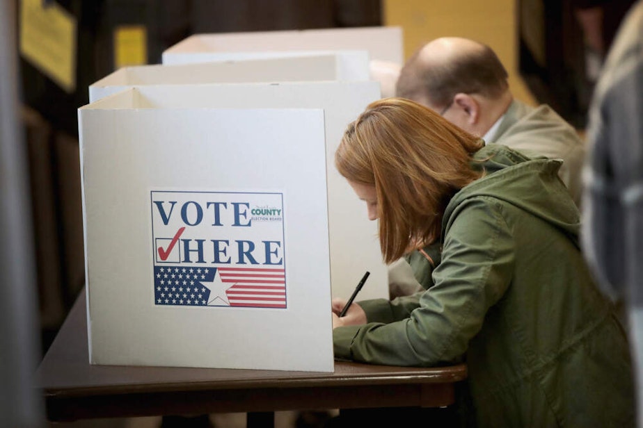 caption: Voters cast ballots at a polling place on Nov. 6, 2018 in Kirkwood, Missouri. (Scott Olson/Getty Images)